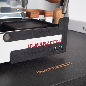 Montering av La Marzocco-logotyp i trä